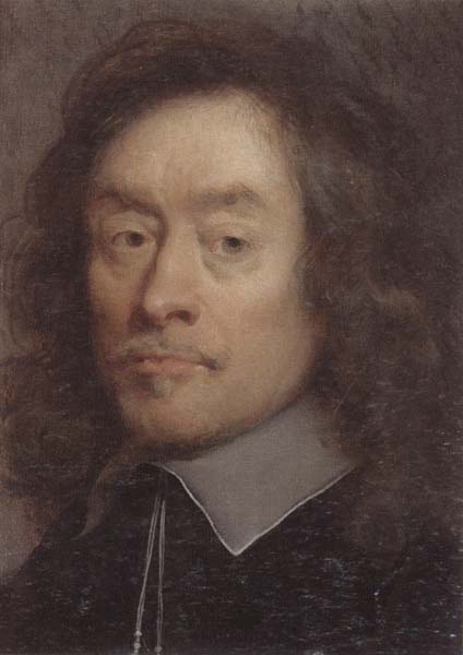 Portrait of a man,hean and shoulders,wearing black with a white lace collar